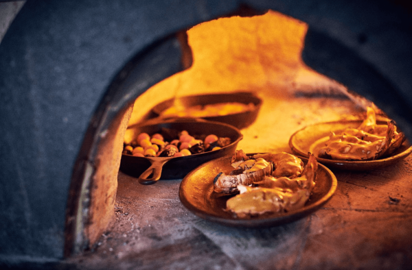 pizza oven cooks fresh foods using traditional techniques